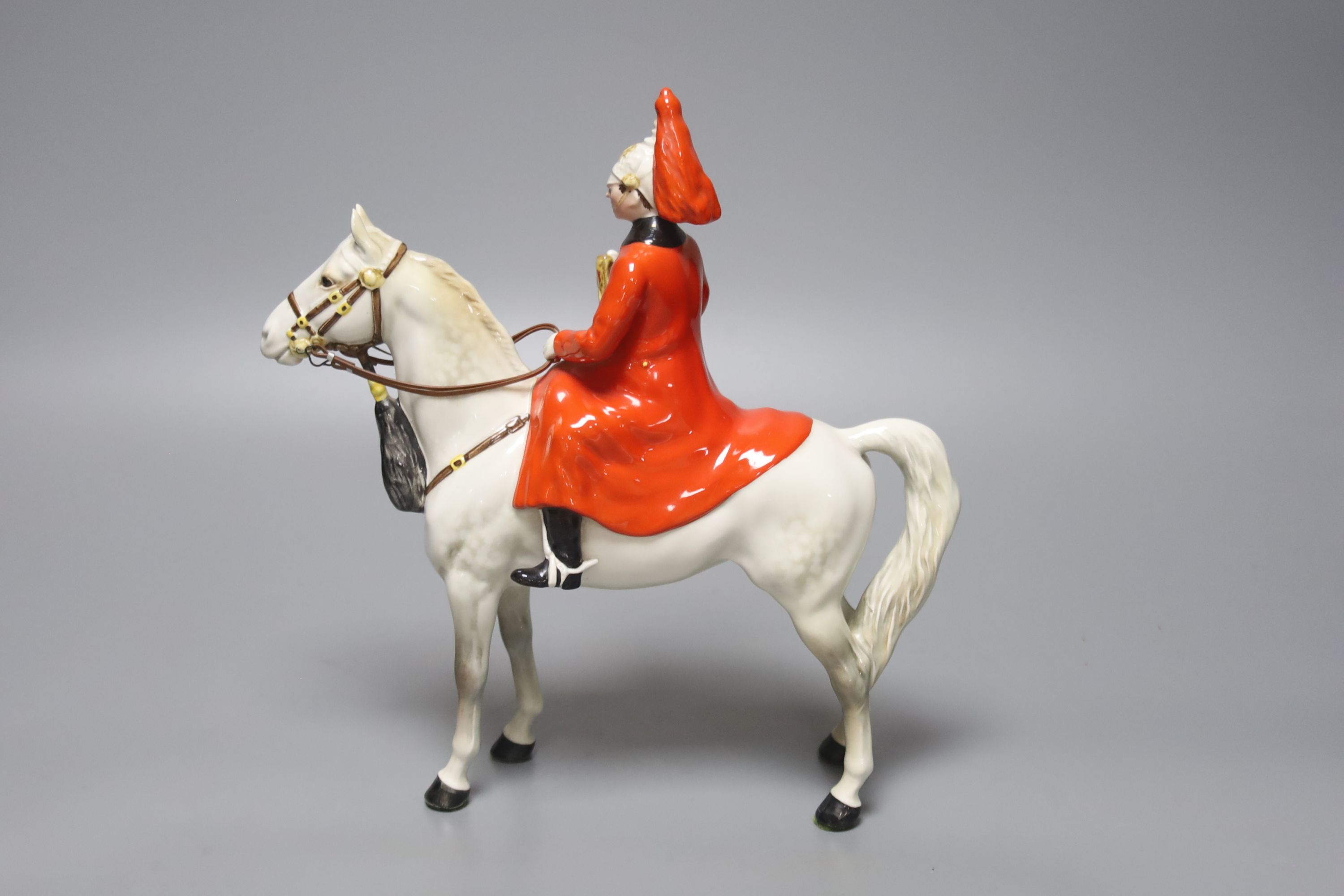 A Beswick group of a Life Guard, height 25cm